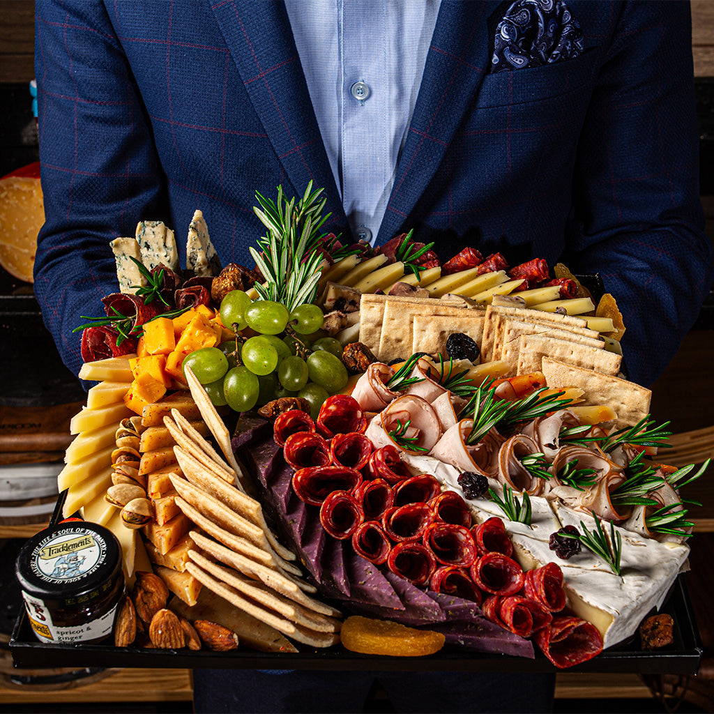 Cheeseroom Deluxe Cheese Platter Featuring an Exceptional Array of Artisanal Cheeses and Premium Cold Cuts