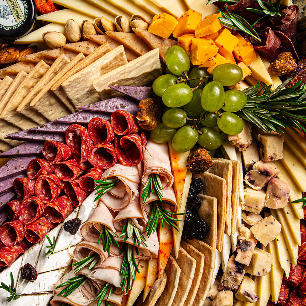 Cheeseroom Deluxe Cheese Platter Featuring an Exceptional Array of Artisanal Cheeses and Premium Cold Cuts