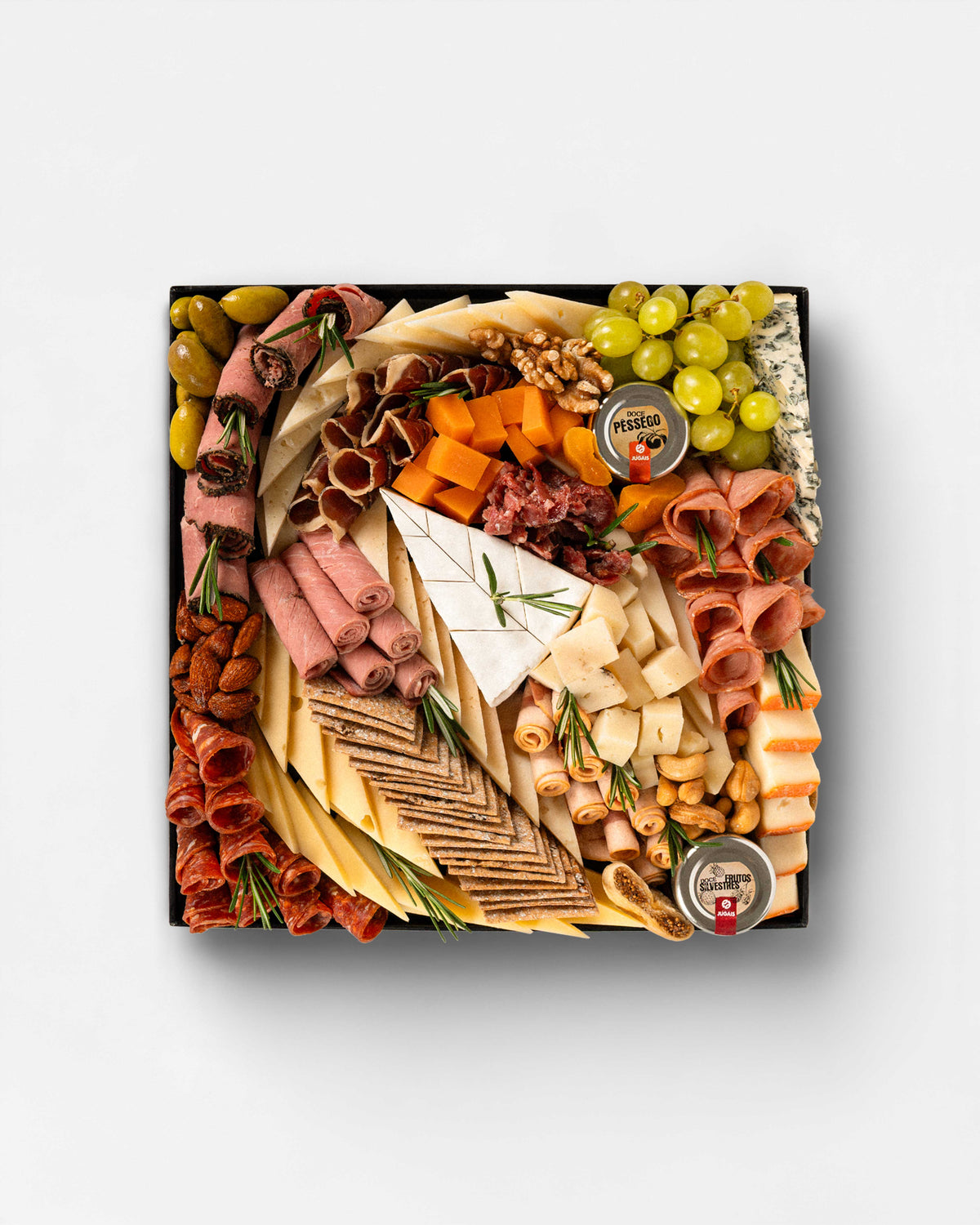 Mediterranean Cheese & Charcuterie Board featuring hard, semi-hard, soft, creamy, nutty, crystallised and aromatic Italian, Spanish and French cheeses, paired with halal turkey, veal, beef, lamb and goose cold cuts, artisanal crackers, grapes, olives, almonds, walnuts and dried fruits. Mediterranean cheese Dubai, Mediterranean cheese platter Dubai, Mediterranean cheese board Dubai, Mediterranean cheese online Dubai, Mediterranean artisanal cheese, cheese platter Dubai, cheese board Dubai, charcuterie board.